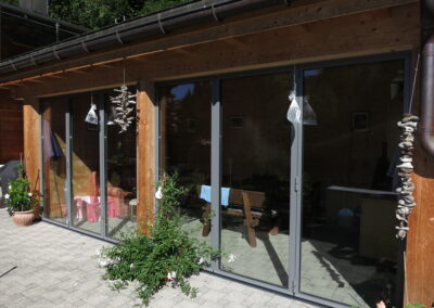 Faltschiebefront mit Glasfüllung