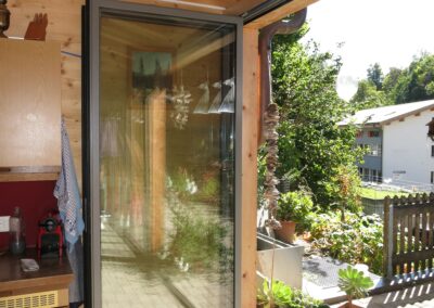 Faltschiebefront mit Glasfüllung